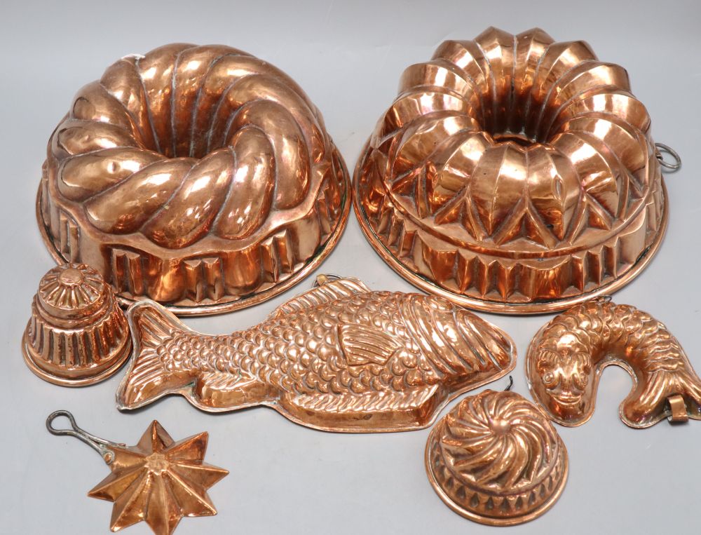 Seven 19th century copper jelly moulds